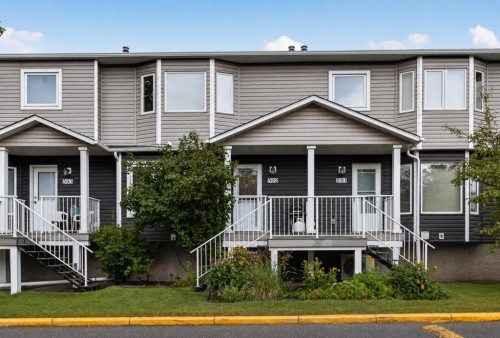592 Regal Park Ne, Calgary, AB - Outdoor With Deck Patio Veranda With Facade