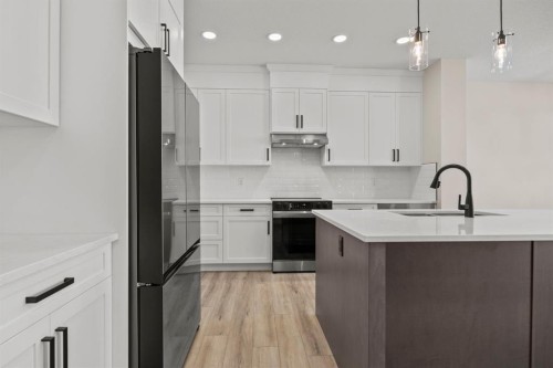 435 Kinniburgh Loop, Chestermere, AB - Indoor Photo Showing Kitchen With Stainless Steel Kitchen With Upgraded Kitchen