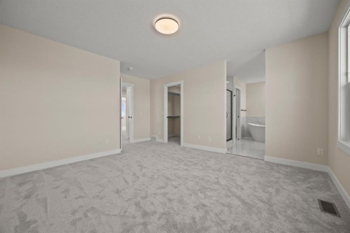 435 Kinniburgh Loop, Chestermere, AB - Indoor Photo Showing Other Room