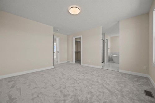 435 Kinniburgh Loop, Chestermere, AB - Indoor Photo Showing Other Room