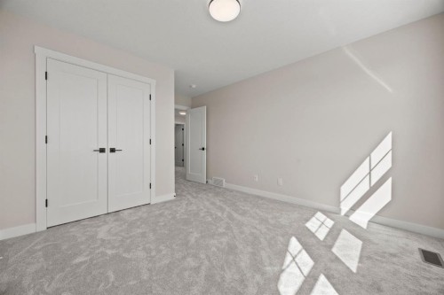 435 Kinniburgh Loop, Chestermere, AB - Indoor Photo Showing Other Room