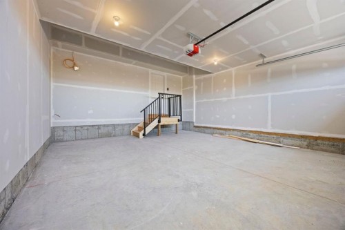 435 Kinniburgh Loop, Chestermere, AB - Indoor Photo Showing Garage