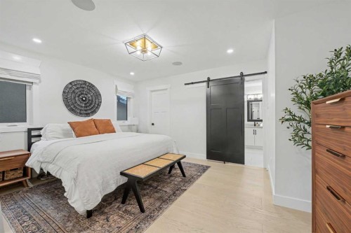 2615 Lougheed Drive Sw, Calgary, AB - Indoor Photo Showing Bedroom