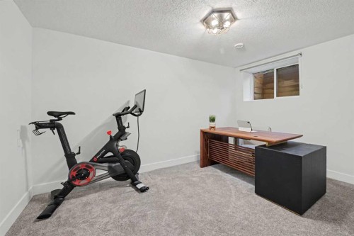 2615 Lougheed Drive Sw, Calgary, AB - Indoor Photo Showing Gym Room