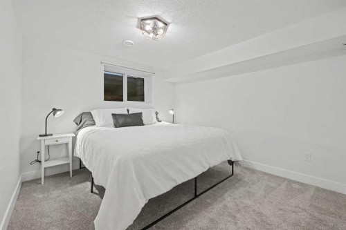 2615 Lougheed Drive Sw, Calgary, AB - Indoor Photo Showing Bedroom