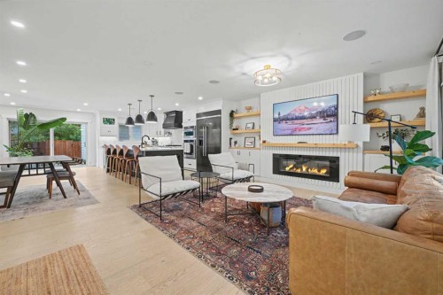 2615 Lougheed Drive Sw, Calgary, AB - Indoor Photo Showing Living Room With Fireplace