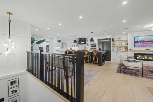 2615 Lougheed Drive Sw, Calgary, AB - Indoor With Fireplace