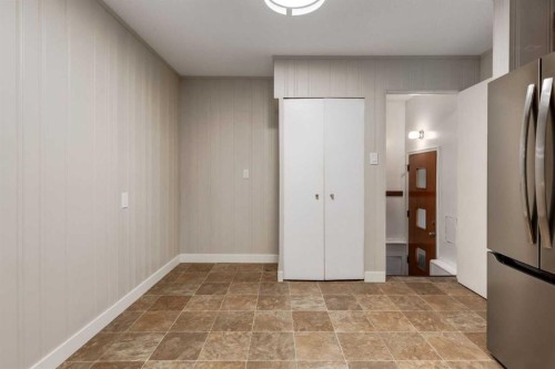 30 Hutton Place Sw, Calgary, AB - Indoor Photo Showing Other Room