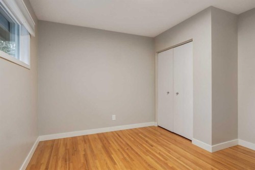 30 Hutton Place Sw, Calgary, AB - Indoor Photo Showing Other Room