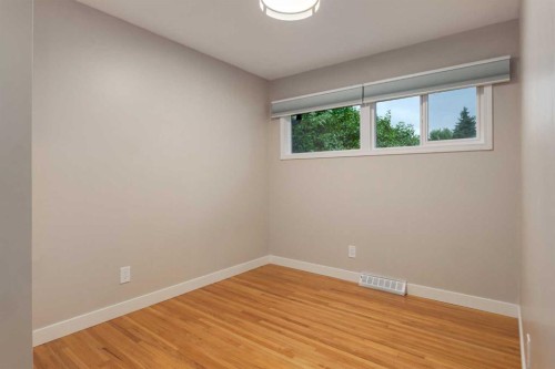30 Hutton Place Sw, Calgary, AB - Indoor Photo Showing Other Room