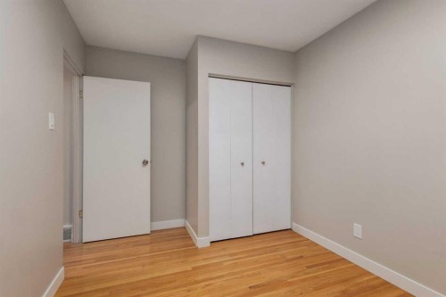 30 Hutton Place Sw, Calgary, AB - Indoor Photo Showing Other Room