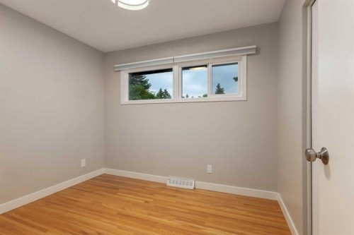 30 Hutton Place Sw, Calgary, AB - Indoor Photo Showing Other Room