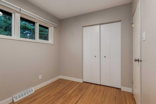 30 Hutton Place Sw, Calgary, AB - Indoor Photo Showing Other Room