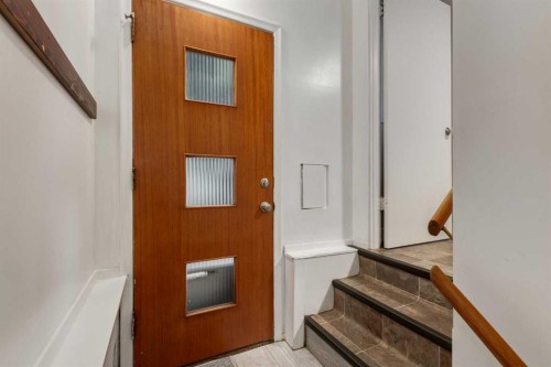 30 Hutton Place Sw, Calgary, AB - Indoor Photo Showing Other Room