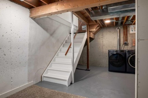 30 Hutton Place Sw, Calgary, AB - Indoor Photo Showing Basement