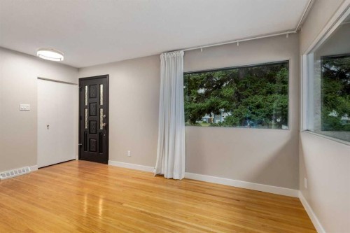 30 Hutton Place Sw, Calgary, AB - Indoor Photo Showing Other Room