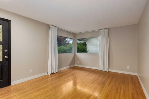 30 Hutton Place Sw, Calgary, AB - Indoor Photo Showing Other Room