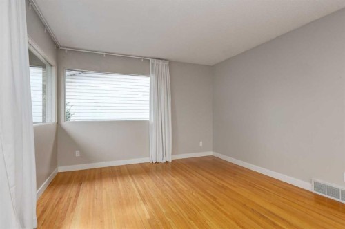 30 Hutton Place Sw, Calgary, AB - Indoor Photo Showing Other Room