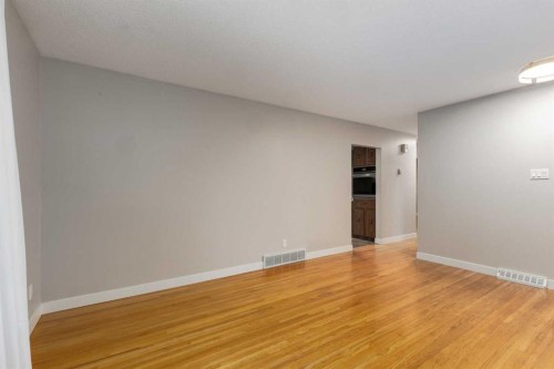 30 Hutton Place Sw, Calgary, AB - Indoor Photo Showing Other Room