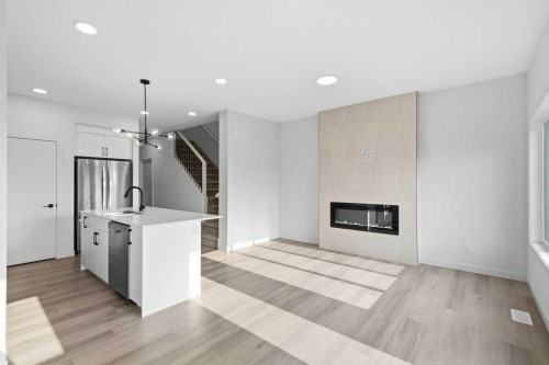 30 Heritage Heath, Cochrane, AB - Indoor With Fireplace