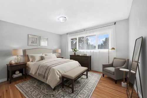 1008 Cantabrian Drive Sw, Calgary, AB - Indoor Photo Showing Bedroom