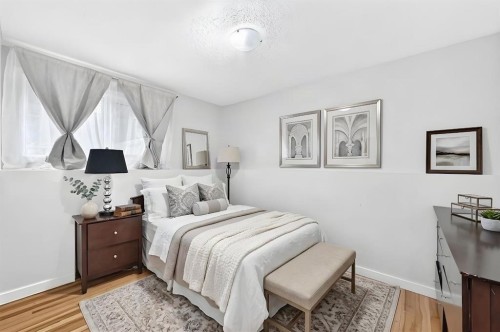 1008 Cantabrian Drive Sw, Calgary, AB - Indoor Photo Showing Bedroom