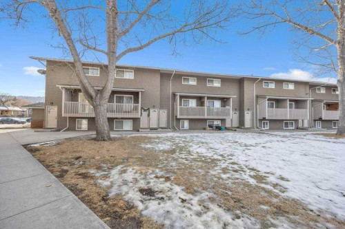 1-8112 36 Avenue Nw, Calgary, AB - Outdoor With Balcony With Facade