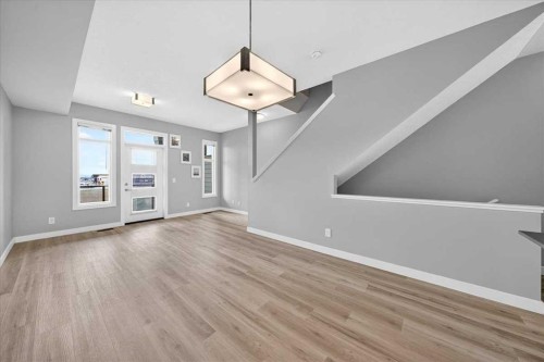 154 Seton Passage Se, Calgary, AB - Indoor Photo Showing Other Room