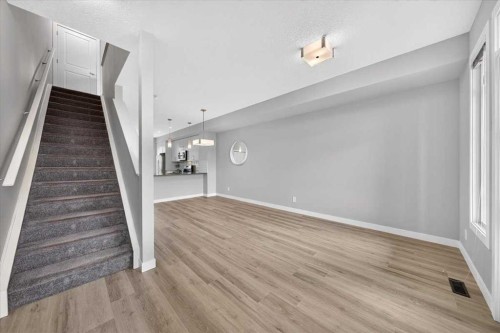 154 Seton Passage Se, Calgary, AB - Indoor Photo Showing Other Room