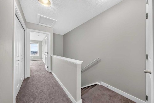 154 Seton Passage Se, Calgary, AB - Indoor Photo Showing Other Room
