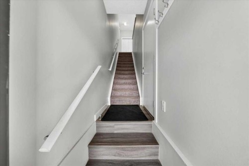154 Seton Passage Se, Calgary, AB - Indoor Photo Showing Other Room
