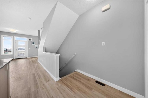 154 Seton Passage Se, Calgary, AB - Indoor Photo Showing Other Room