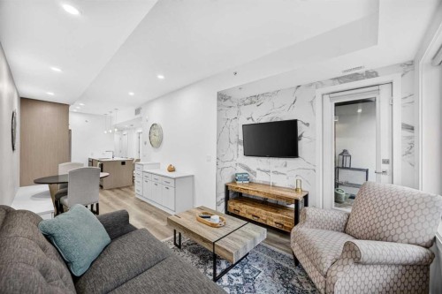 207-3450 19 Street Sw, Calgary, AB - Indoor Photo Showing Living Room