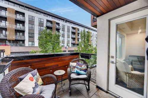 207-3450 19 Street Sw, Calgary, AB - Outdoor With Balcony With Exterior