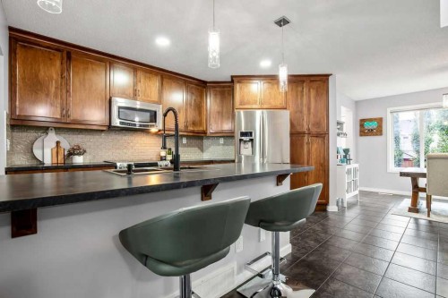 81 New Brighton Heights Se, Calgary, AB - Indoor Photo Showing Kitchen With Upgraded Kitchen