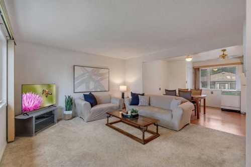 219 Tache Avenue Nw, Calgary, AB - Indoor Photo Showing Living Room