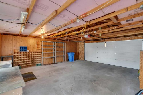 219 Tache Avenue Nw, Calgary, AB - Indoor Photo Showing Garage