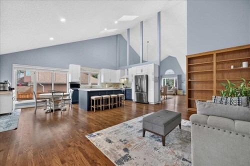 876 Shawnee Drive Sw, Calgary, AB - Indoor Photo Showing Living Room