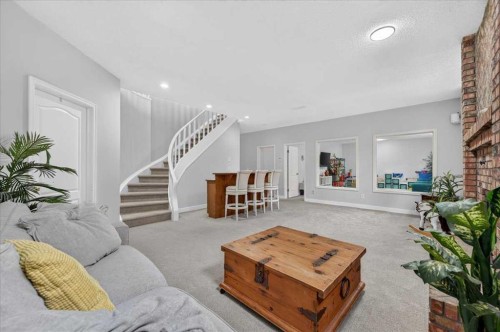 876 Shawnee Drive Sw, Calgary, AB - Indoor Photo Showing Living Room