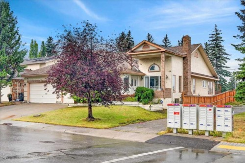 876 Shawnee Drive Sw, Calgary, AB - Outdoor With Facade
