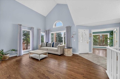876 Shawnee Drive Sw, Calgary, AB - Indoor Photo Showing Living Room