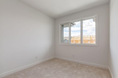 704 Sora Boulevard Se, Calgary, AB - Indoor Photo Showing Other Room