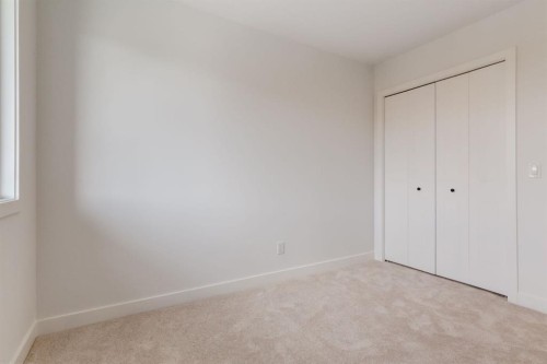 704 Sora Boulevard Se, Calgary, AB - Indoor Photo Showing Other Room