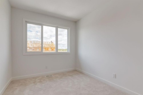 704 Sora Boulevard Se, Calgary, AB - Indoor Photo Showing Other Room
