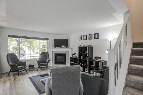 58 Sierra Morena Gardens Sw, Calgary, AB - Indoor With Fireplace