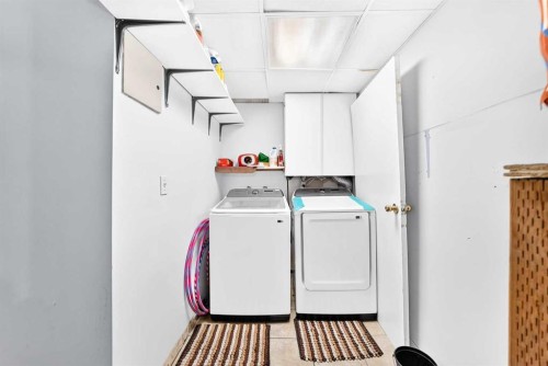 60 Falmere Court Ne, Calgary, AB - Indoor Photo Showing Laundry Room