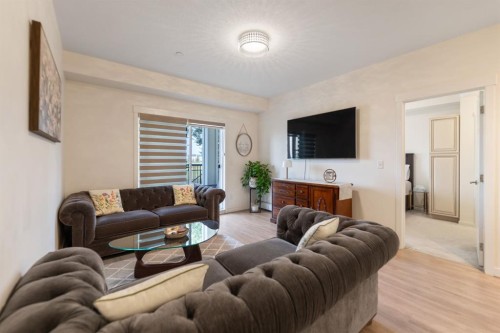 3108-99 Copperstone Park Se, Calgary, AB - Indoor Photo Showing Living Room