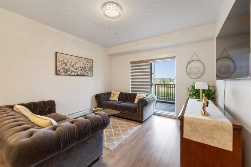 3108-99 Copperstone Park Se, Calgary, AB - Indoor Photo Showing Living Room