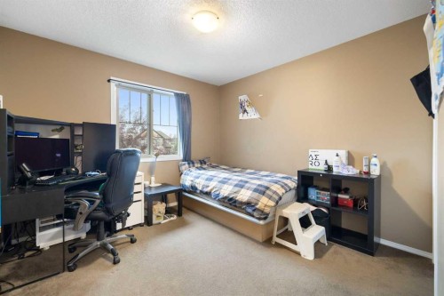 19 Silverado Skies Bay Sw, Calgary, AB - Indoor Photo Showing Bedroom