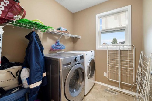19 Silverado Skies Bay Sw, Calgary, AB - Indoor Photo Showing Laundry Room